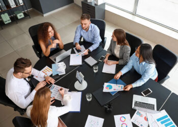 Business team collaborating in a boardroom.