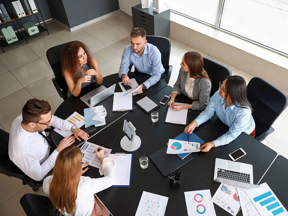 Business team collaborating in a boardroom.